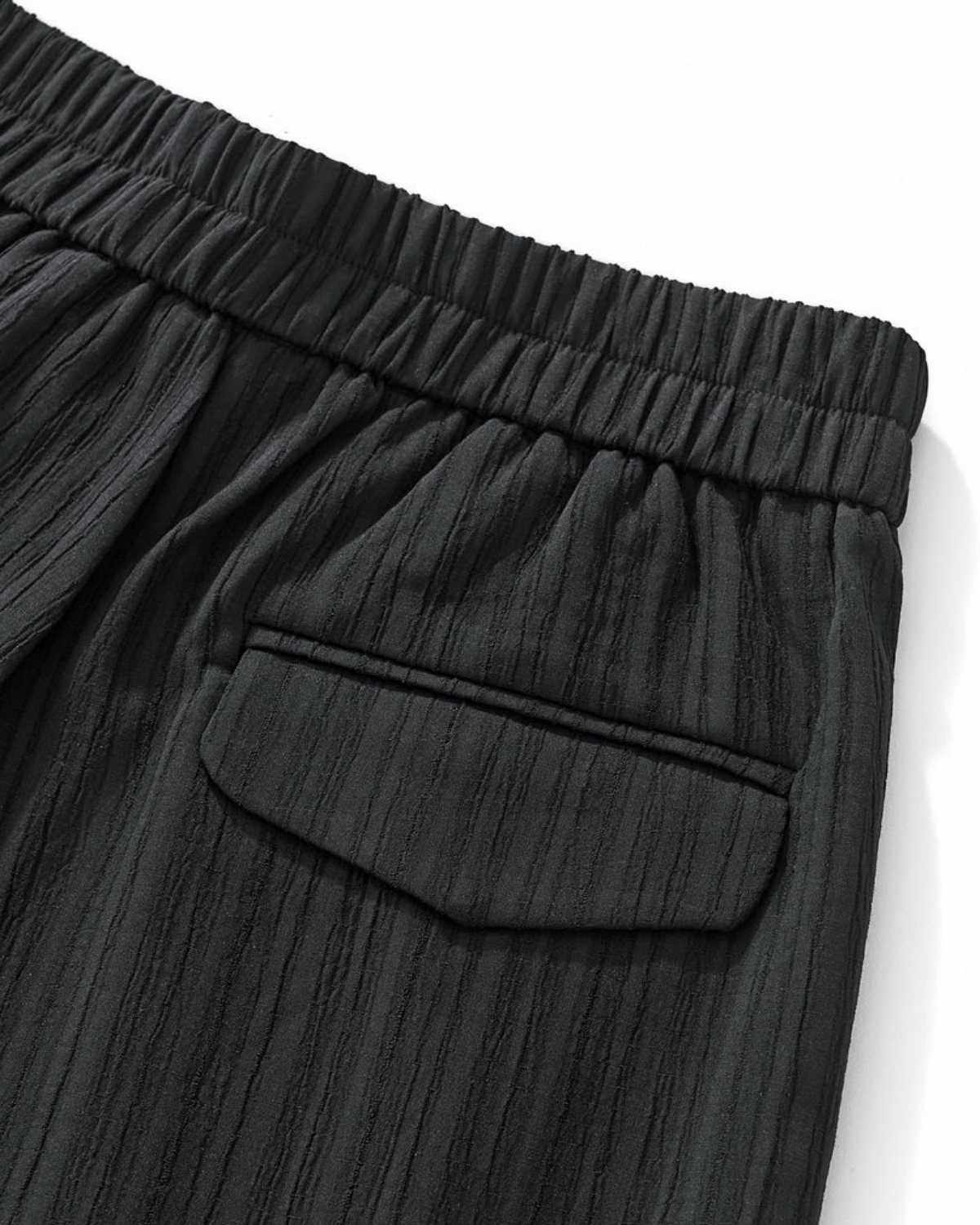 ZEVEN NOIR PLEATED PANTS